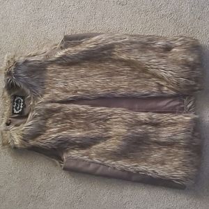 Like new taupe colored fur vest